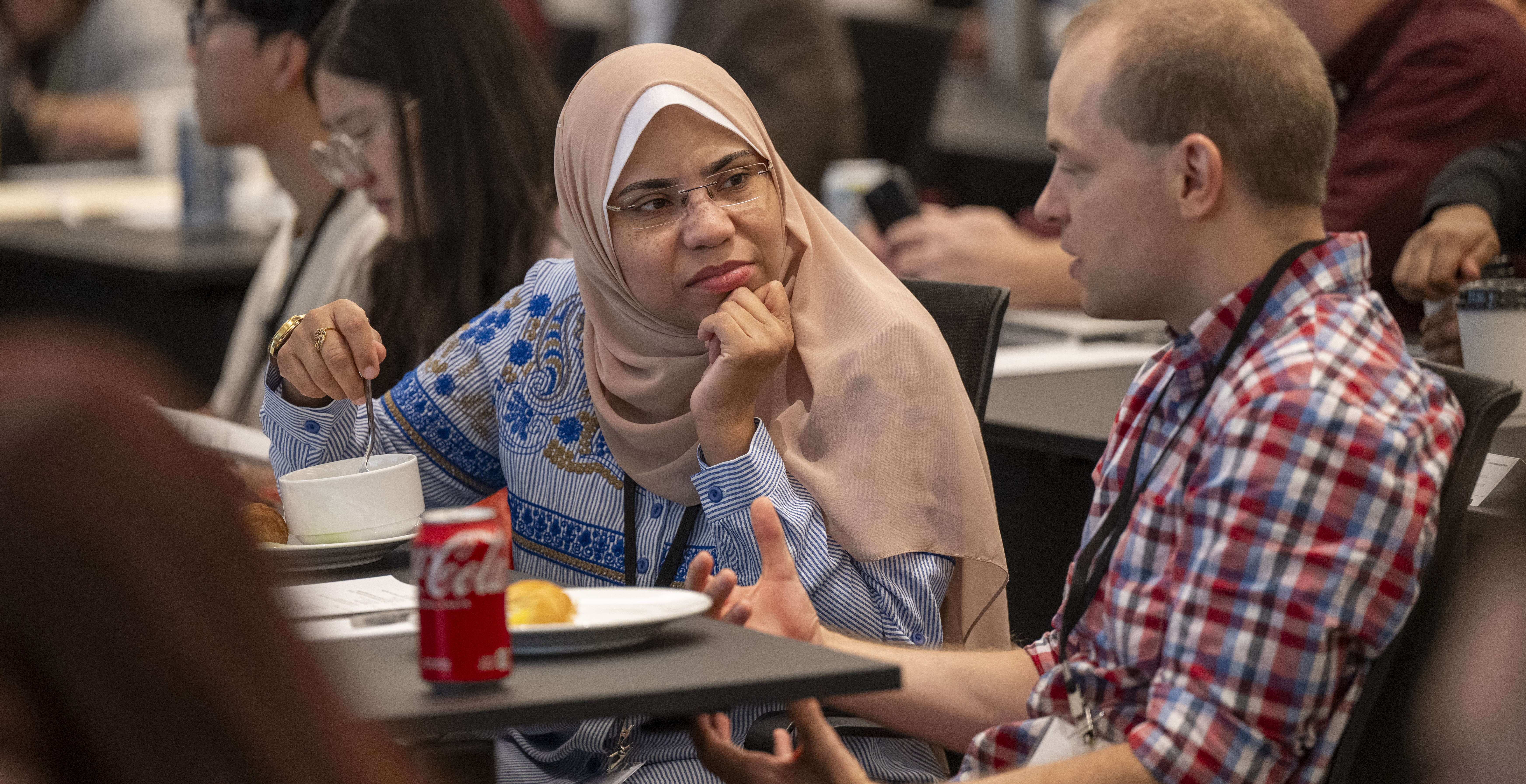 Jonas Center Cellular Therapy Symposium Two participants talking at the Jonas Center Cellular Therapy Symposium.